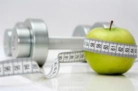 An apple with dumbbell