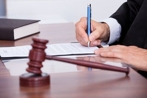 gavel sits on a judge's desk to decide on child support obligations gavel sits on a judge's desk to decide on child support obligations