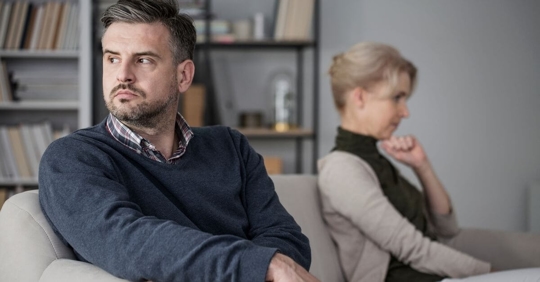couple looking away from one another