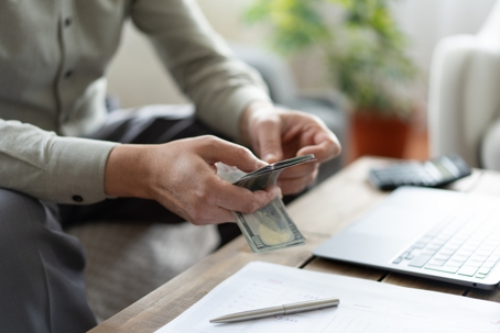 person counting money