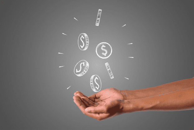 Hands holding illustrated coins to symbolize winning the lottery